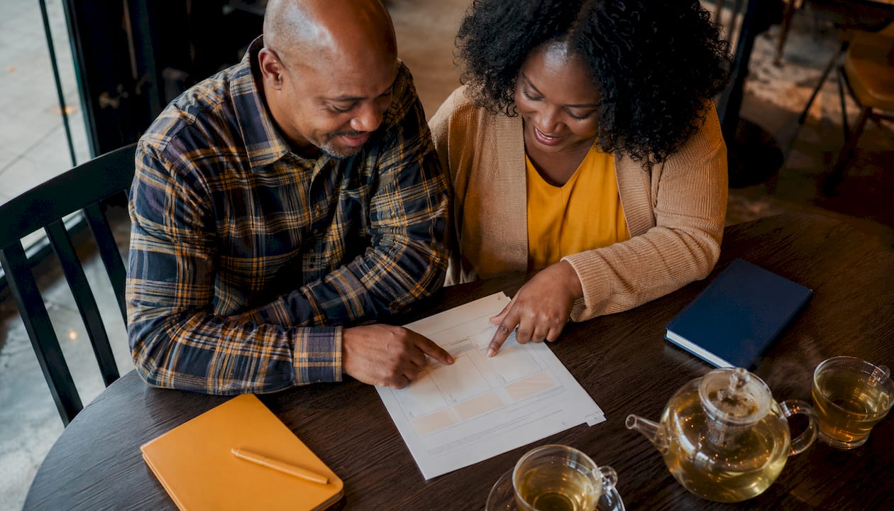 Couple reviewing conflict resolution plan