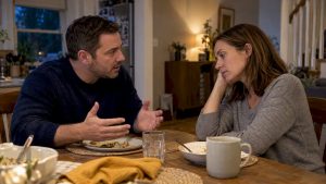 Couple navigating a tense conversation at home