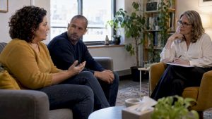 Therapist listening to a couple in session
